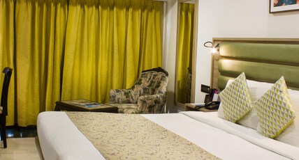 Regenta Place The Emerald Room Type - Deluxe Room with 15 percent Food and Beverage Discounts Regenta Place The Emerald Room Type - Deluxe Room with 15 percent Food and Beverage Discounts