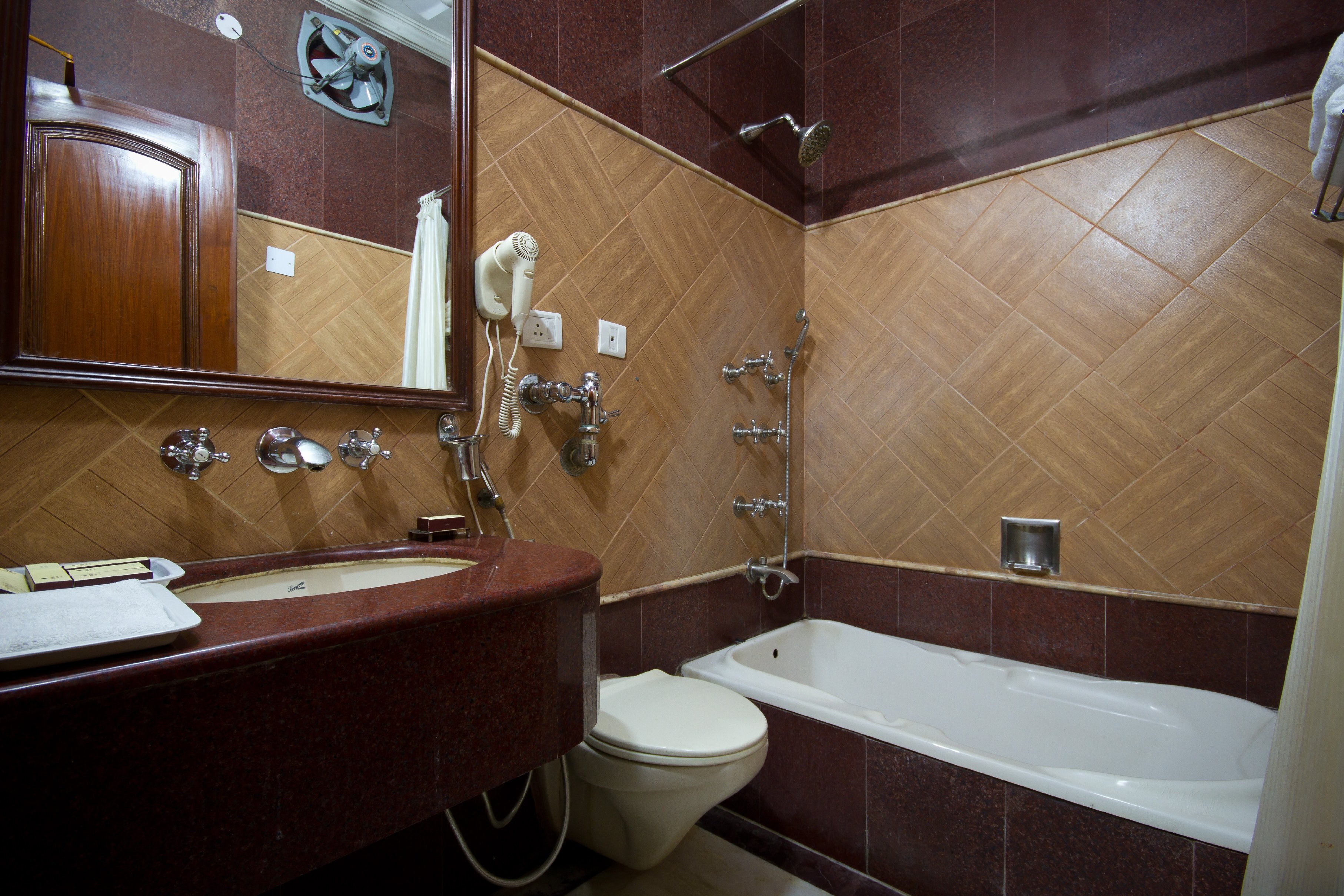 Hotel Sunstar Grand - Tap to explore photos