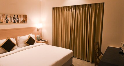 Sarovar Portico Rivera Ahmedabad Room Type - Superior Room - 1 Double Bed 20 43SQM Free WiFi Living Area Sarovar Portico Rivera Ahmedabad Room Type - Superior Room - 1 Double Bed 20 43SQM Free WiFi Living Area