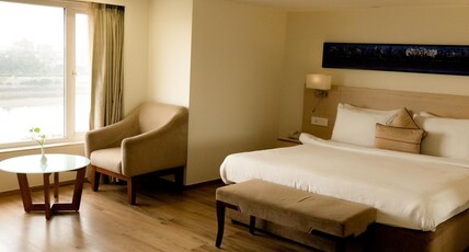 Sarovar Portico Rivera Ahmedabad Room Type - Deluxe Room - 1 Double Bed 25 45SQM Free WiFi Living Area Sarovar Portico Rivera Ahmedabad Room Type - Deluxe Room - 1 Double Bed 25 45SQM Free WiFi Living Area