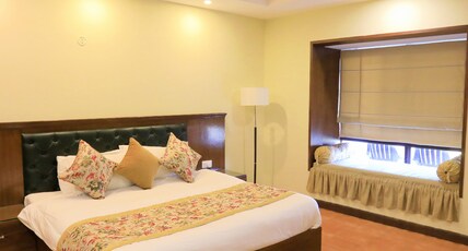 Woodsvilla Resort Room Type - Deluxe Room Woodsvilla Resort Room Type - Deluxe Room