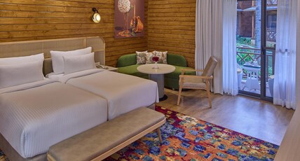 Royal Orchid Resort & Convention Centre Room Type - Wooden Cottage with balcony and Bathtub
