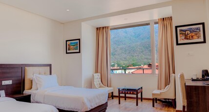Hotel Vasundhara Palace Room Type - Twin Bed Premium with Partial Ganges View Hotel Vasundhara Palace Room Type - Twin Bed Premium with Partial Ganges View
