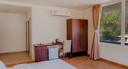 Hotel Vasundhara Palace Room Type - Double Bed Premium with partial Ganges View Hotel Vasundhara Palace Room Type - Double Bed Premium with partial Ganges View