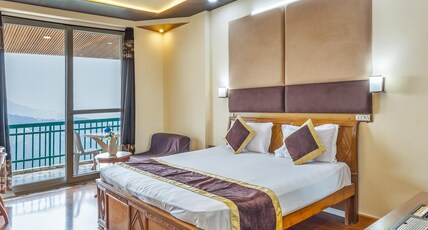 Hotel Grand Sunset Room Type - Deluxe room - With Full Valley View and Balcony Hotel Grand Sunset Room Type - Deluxe room - With Full Valley View and Balcony