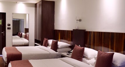 Hotel Holiday Resort Room Type - Family Sea View Room with 2 Queen Beds