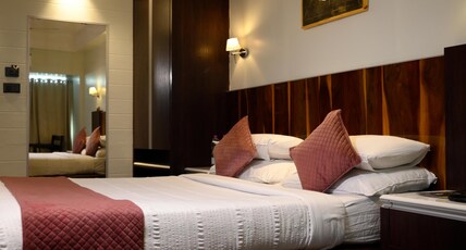 Hotel Holiday Resort Room Type - Deluxe Room (1st Floor)