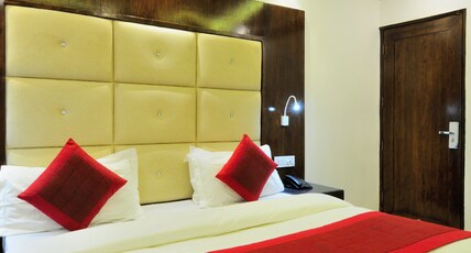 The Yuvraj By LIVIQ Room Type - Elite Deluxe Room with Free Airport Pickup or Drop The Yuvraj By LIVIQ Room Type - Elite Deluxe Room with Free Airport Pickup or Drop