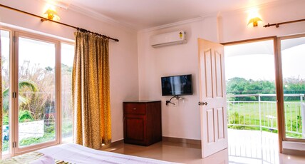 Periyar Meadows Room Type - Premium Suite AC Room With Balcony Periyar Meadows Room Type - Premium Suite AC Room With Balcony