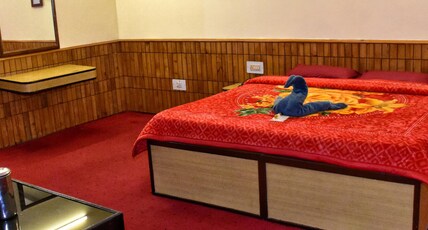 Hotel New Adarsh - A Mall Road Hotel Room Type - Deluxe Room (2nd floor) Hotel New Adarsh - A Mall Road Hotel Room Type - Deluxe Room (2nd floor)