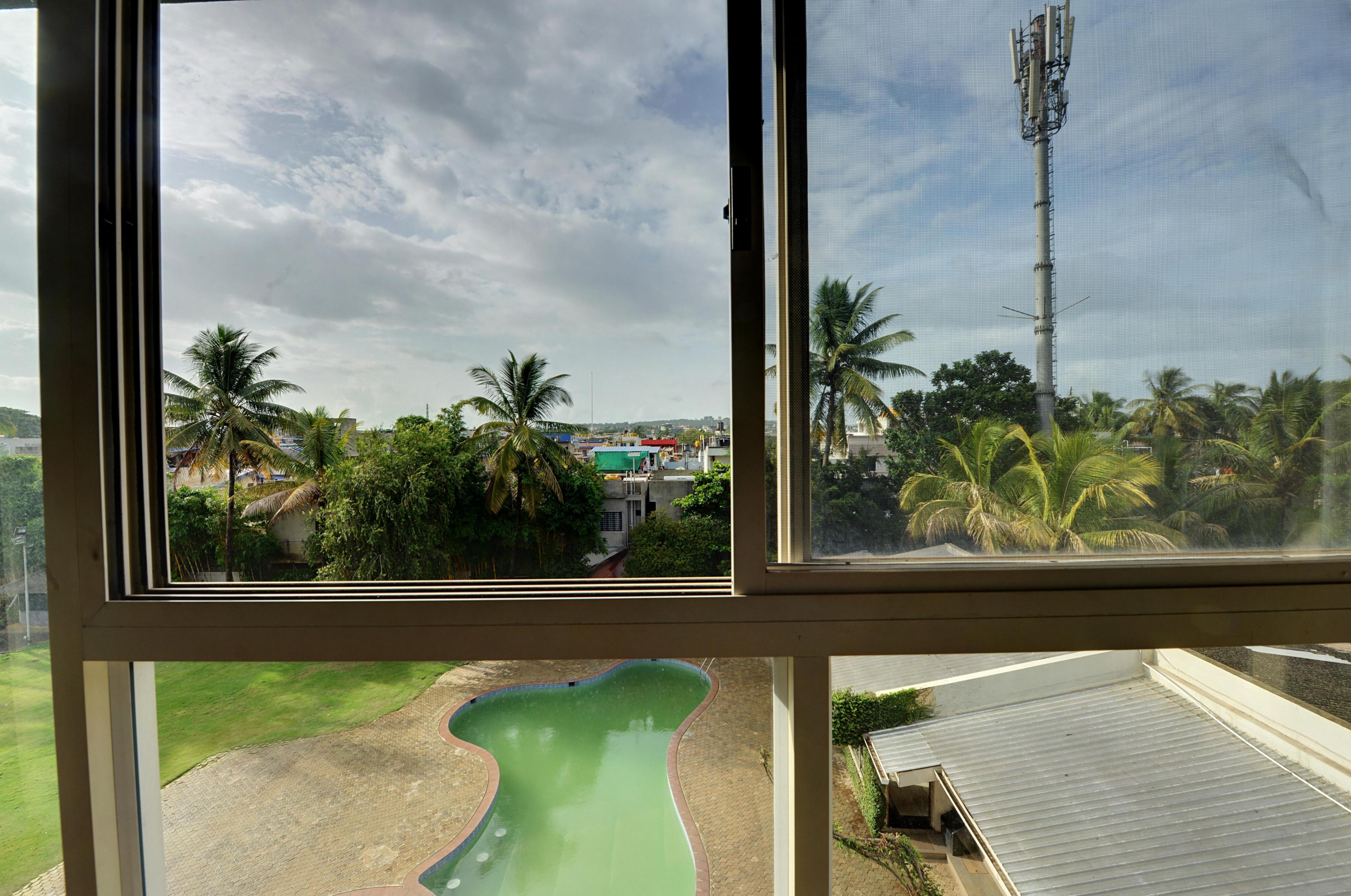 HOTEL SANKAM RESIDENCY - Tap to explore photos