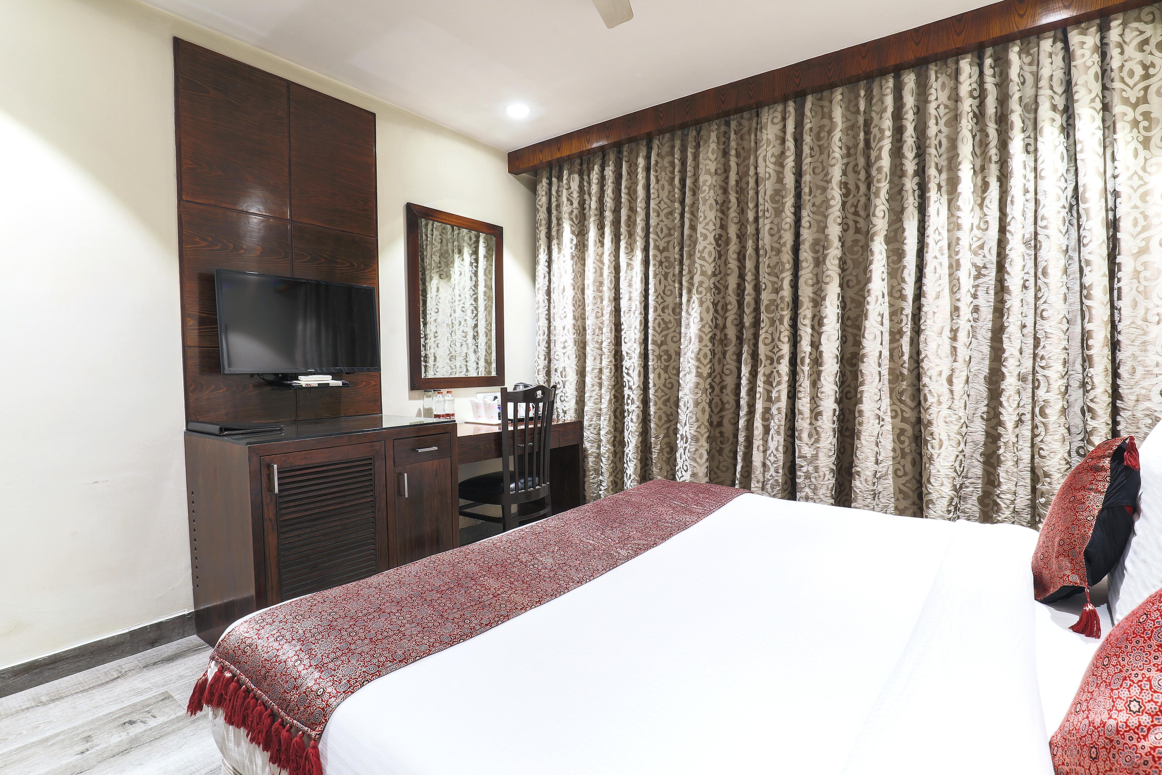 Hotel Bluestone (Nehru Place) by The Cosy Hotels - Tap to explore photos