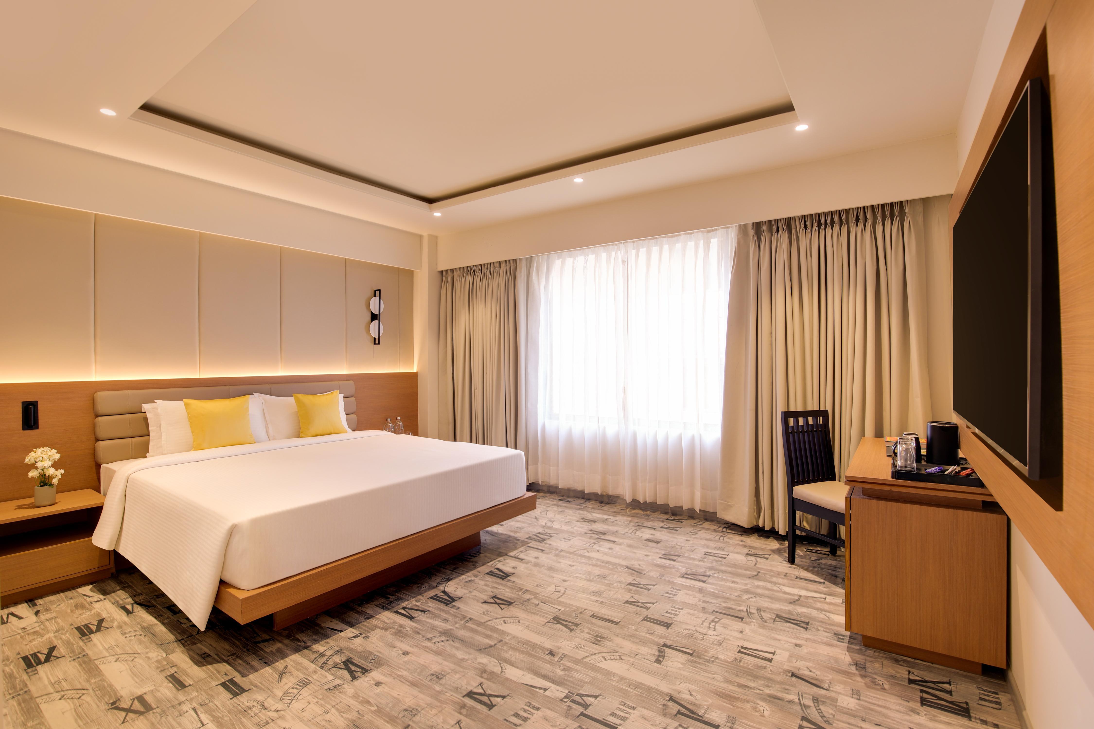 Regenta Place CG road Room Type - Deluxe King Room