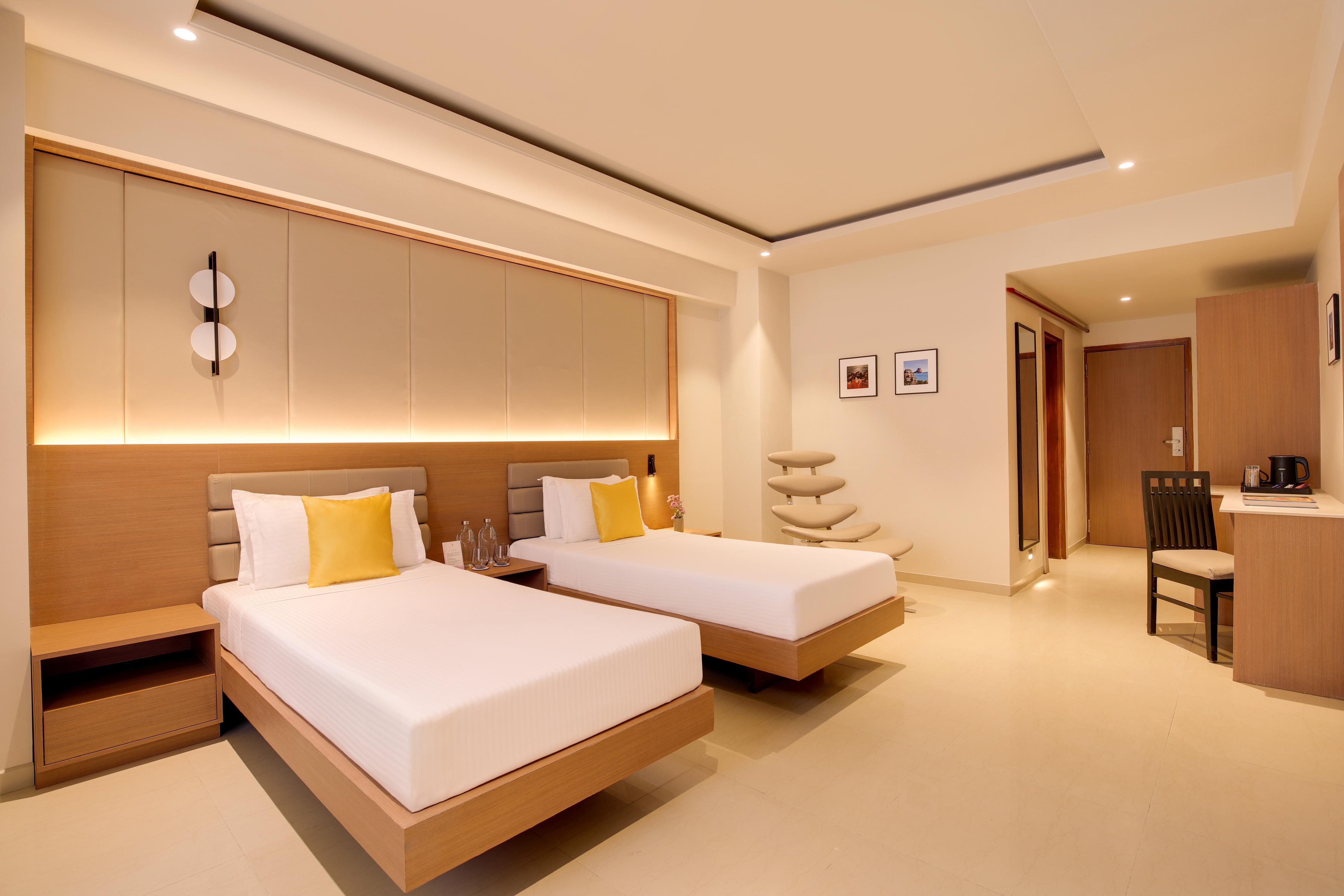 Regenta Place CG road Room Type - Deluxe Twin Room