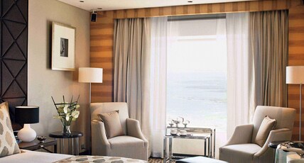 Taj Lands End, Mumbai Room Type - Luxury Suite Sea View with Bathtub, High tea, evening cocktails, butler service, Complimentary 1 way