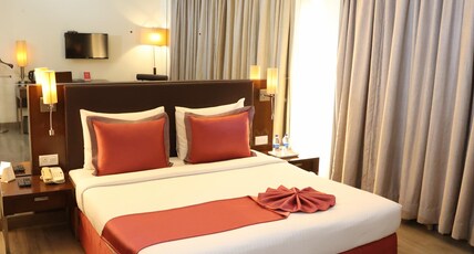 St Laurn- Koregaon Park Room Type - DELUXE ROOM KING BED WITH BATHTUB