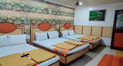Mallika Residency, near US Consulate. Room Type - DELUXE 6 BED NON AC Mallika Residency, near US Consulate. Room Type - DELUXE 6 BED NON AC