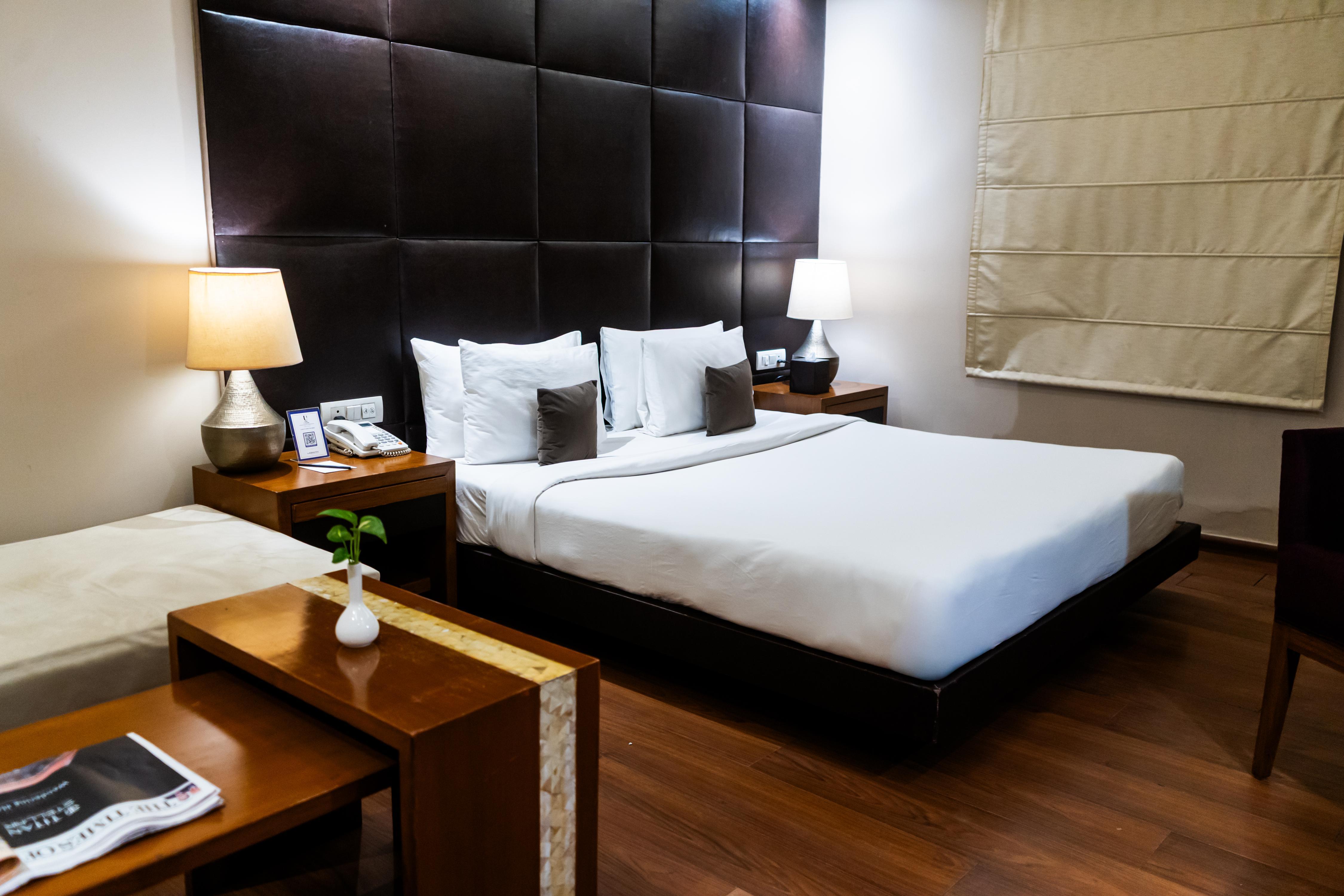 Udman Hotel, Panchshila Park - Tap to explore photos