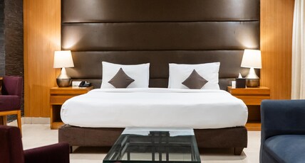 Udman Hotel, Panchshila Park Room Type - Suite with Bathtub and Balcony