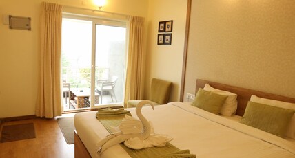 Delightz Inn Room Type - Studio Garden-View with Balcony