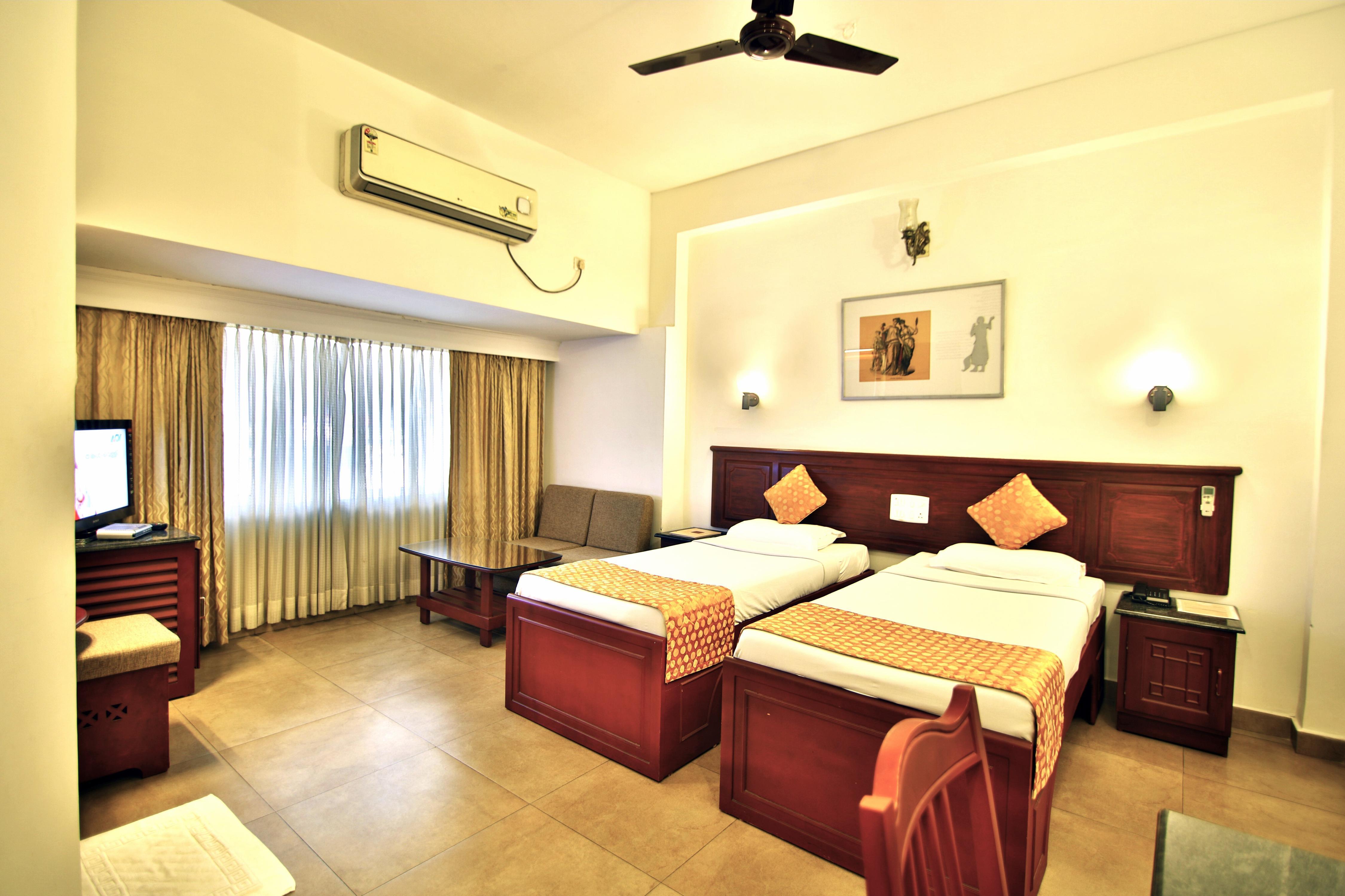 Hotel Aida, Kottayam - Tap to explore photos