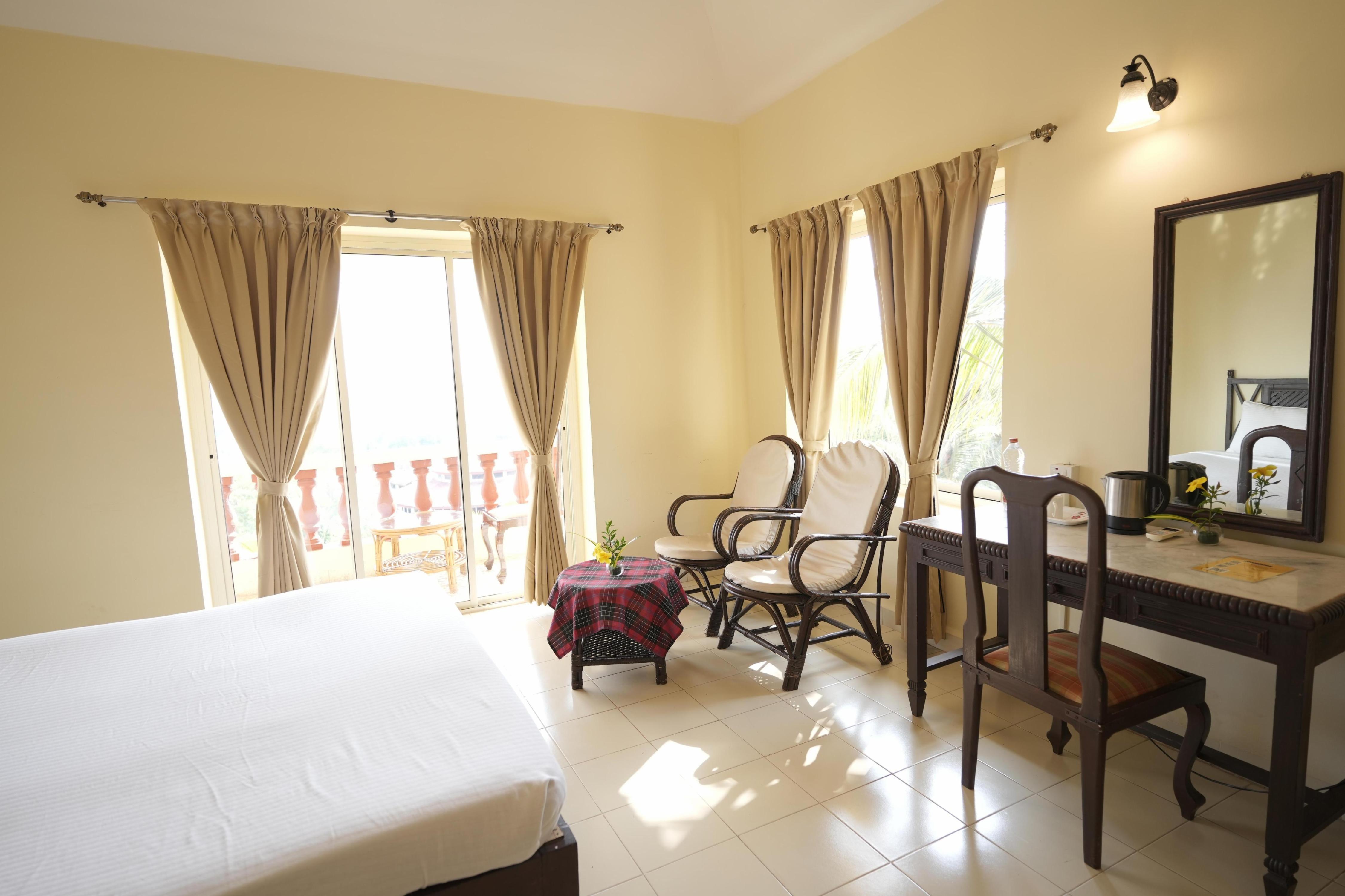 Indismart Woodbourne Resort - Tap to explore photos