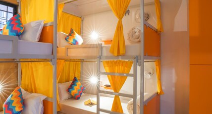 goSTOPS Bengaluru, Gandhi Nagar Majestic - Private Rooms & Dorms Room Type - Bed in 8 Bed Male Only AC Dormitory Room with Ensuite Bathroom - UPPER BED