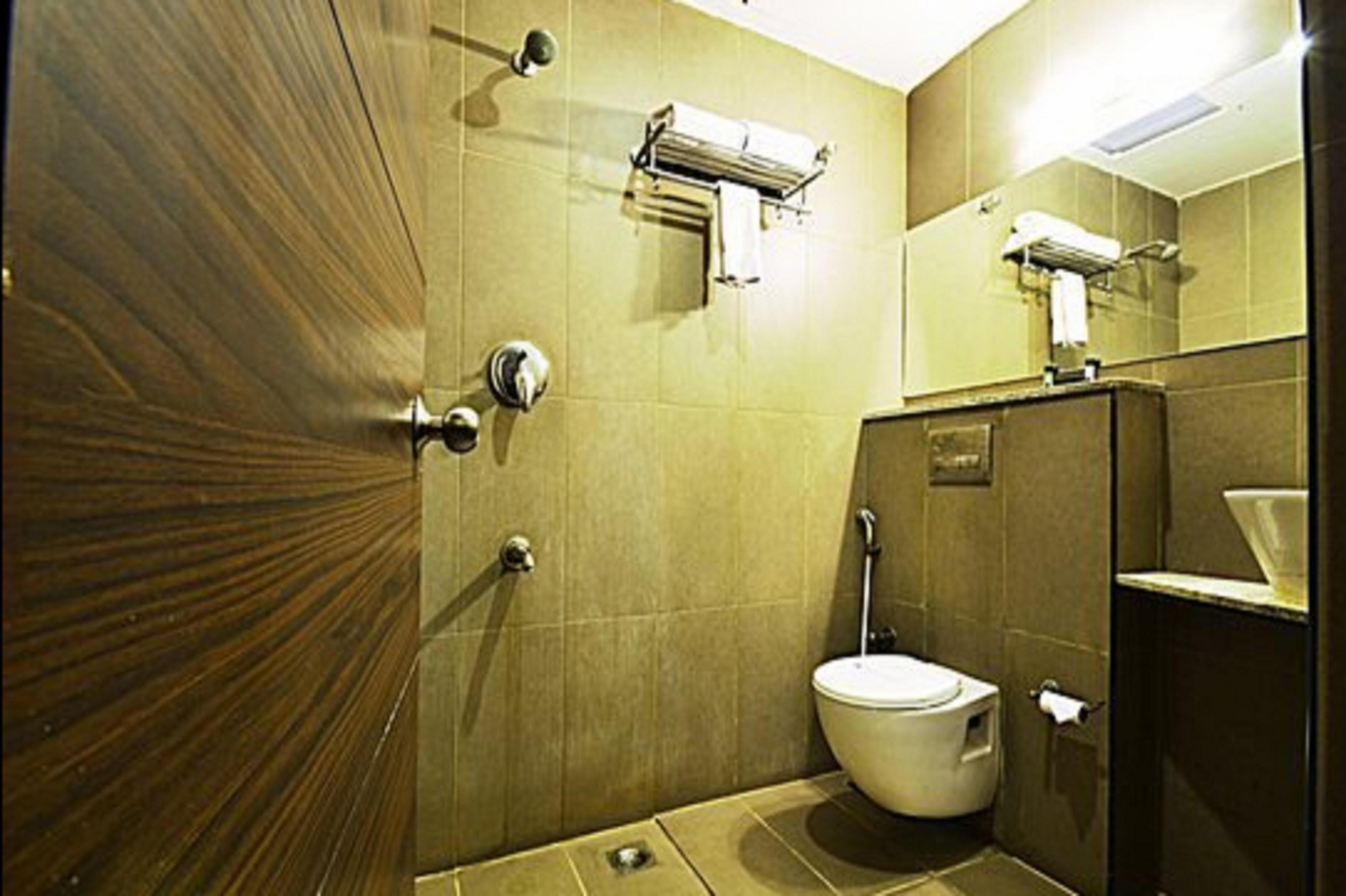 Redfox AMPA Hotels( Skyone Mall) - Tap to explore photos