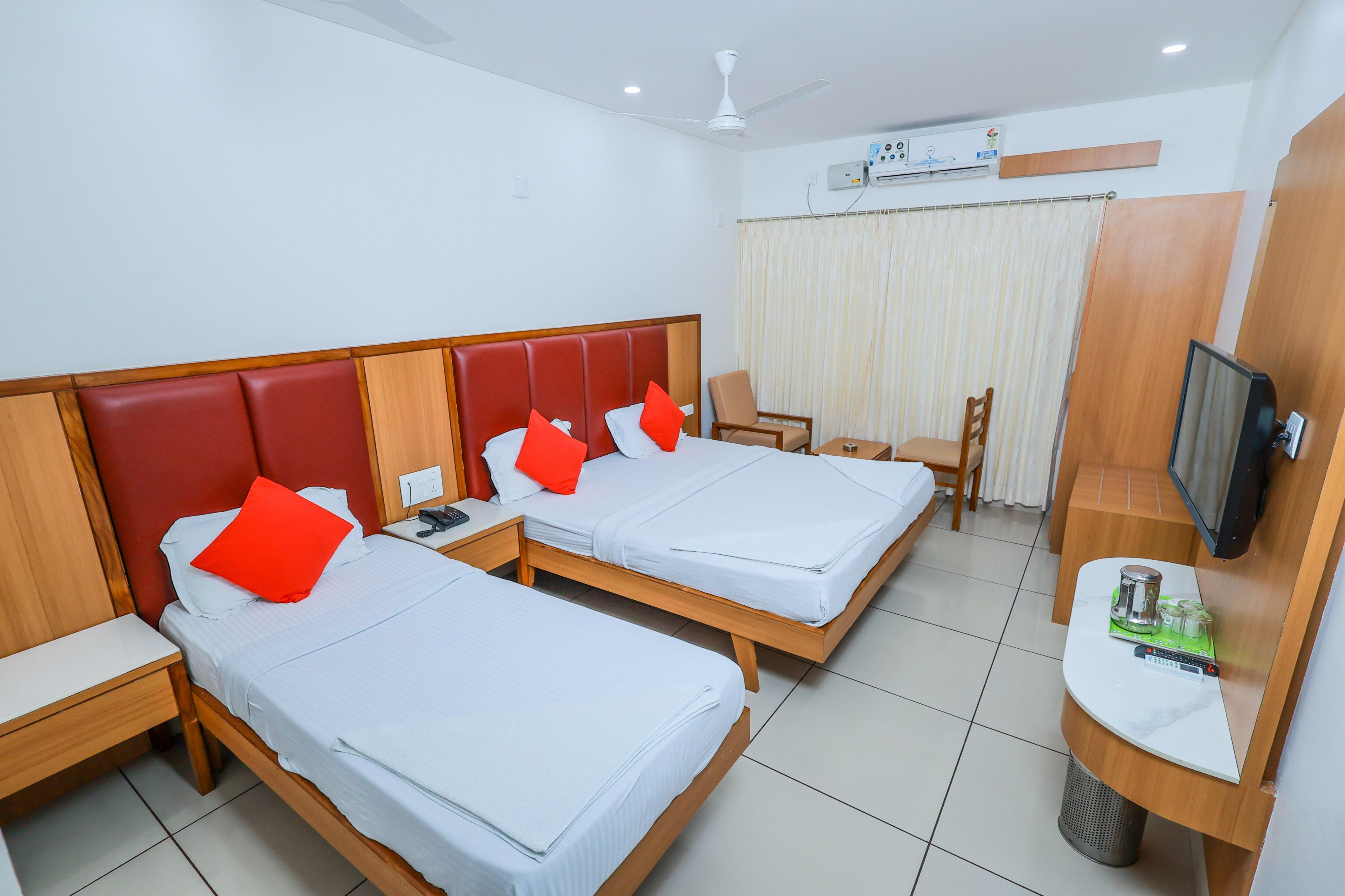 Hotel Janardana Room Type - Deluxe AC- Triple