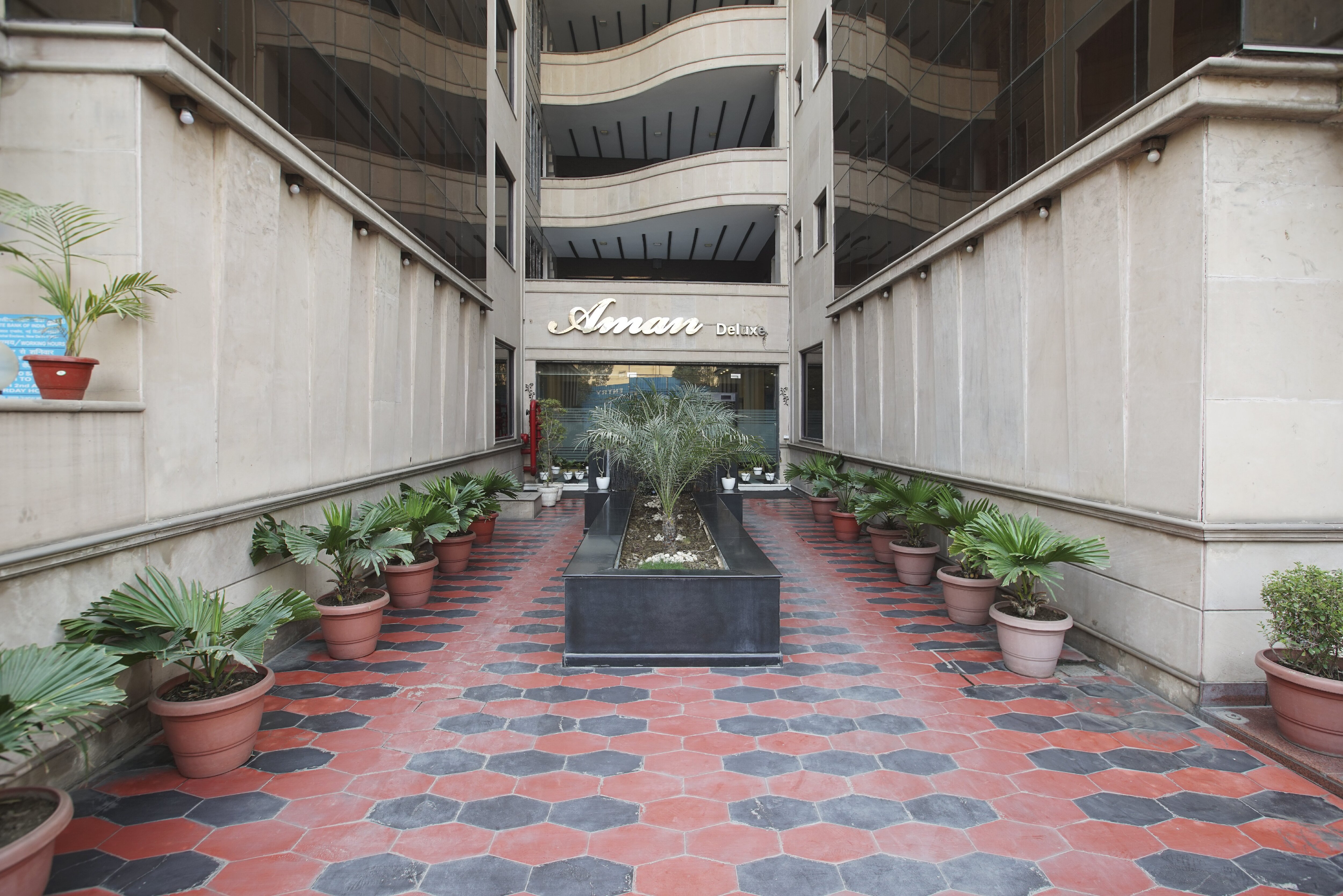 Aman Deluxe Hotel - Tap to explore photos