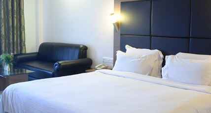Jamindars Palace,BeachFront Hotel Room Type - Deluxe lawn view upper floor Room with Balcony