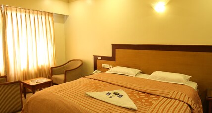 HOTEL KOHINOOR SQUARE Room Type - STANDARD AC ROOM