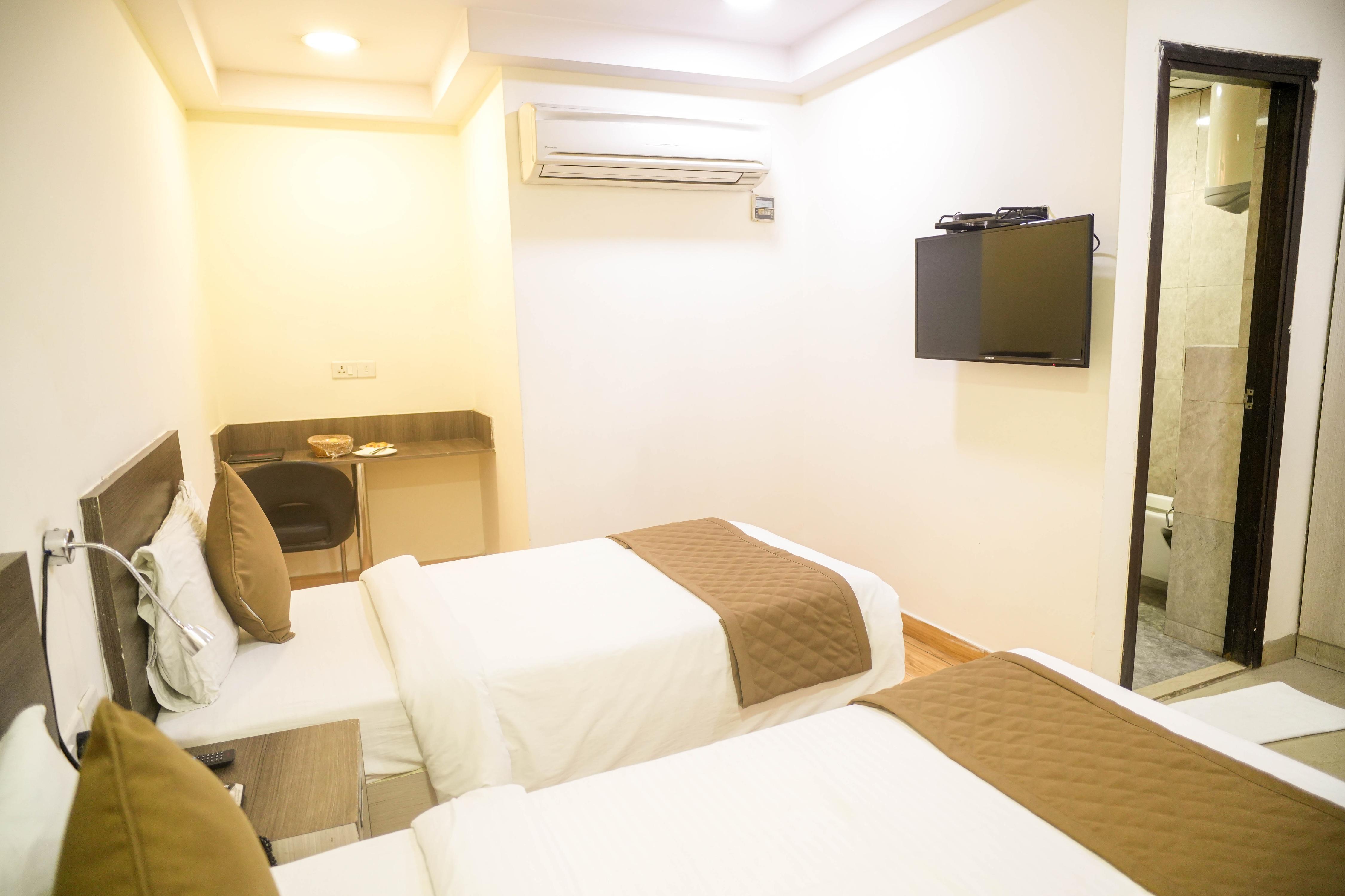 Hyphen Business Hotel - Tap to explore photos