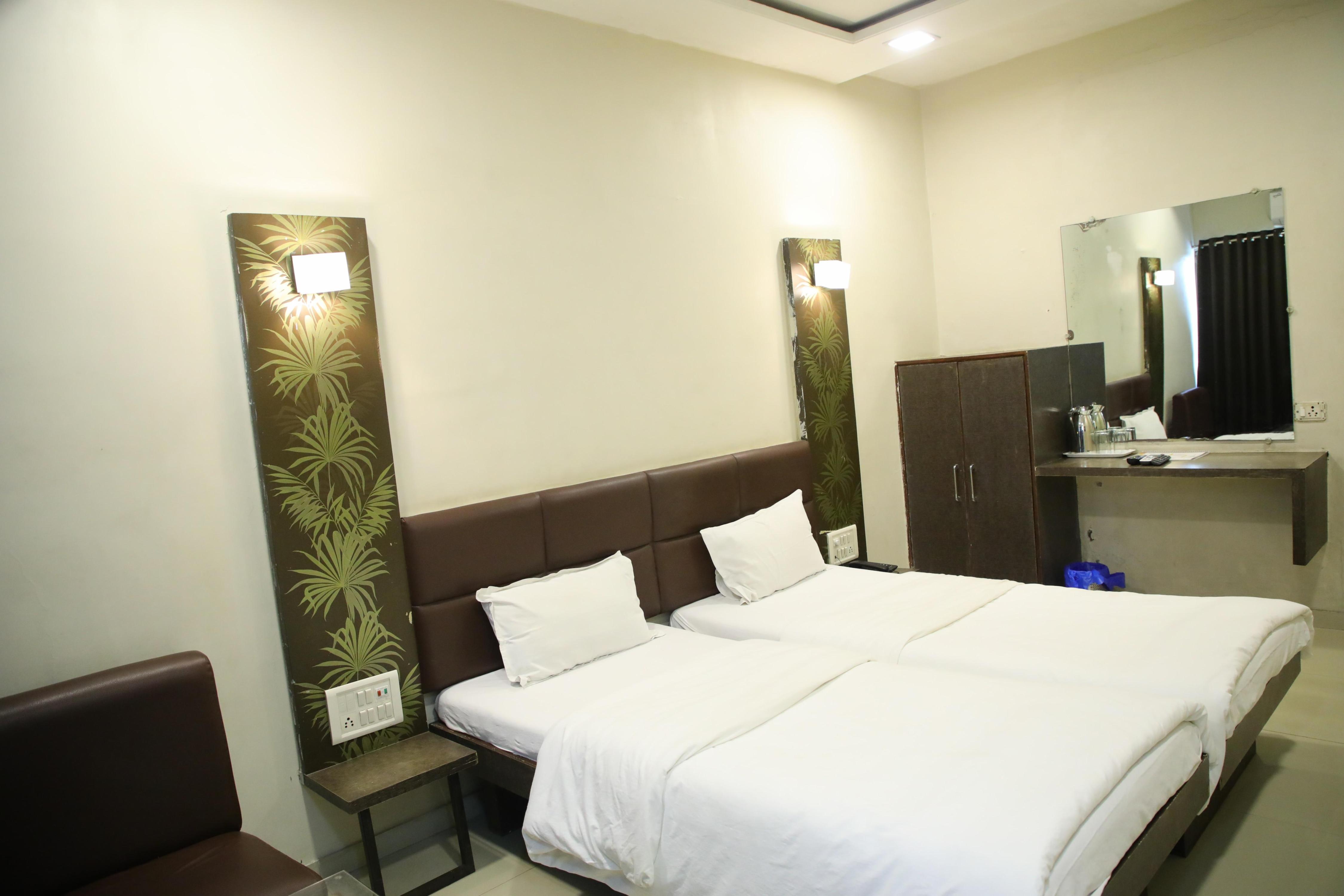 Hotel Raj - Surat - Tap to explore photos