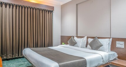 Hotel KB's Grand (Complimentary Pick Up and Drop to Shri Saibaba Samadhi Mandir) Room Type - Silver Double Bed Room With King Bed and Complimentary pickup and drop to Saibaba Samadhi mandir.