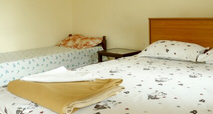 Palm Grove Service Villa | Rooms & Wi-Fi Room Type - Deluxe AC Room Palm Grove Service Villa | Rooms & Wi-Fi Room Type - Deluxe AC Room
