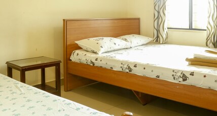 Palm Grove Service Villa | Rooms & Wi-Fi Room Type - Deluxe AC Room Palm Grove Service Villa | Rooms & Wi-Fi Room Type - Deluxe AC Room