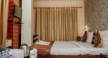 Hotel Sahu Near Kashi Vishwanath Temple Gate Room Type - Deluxe Family Room (Double Bed with Double Bunk Bed) Hotel Sahu Near Kashi Vishwanath Temple Gate Room Type - Deluxe Family Room (Double Bed with Double Bunk Bed)
