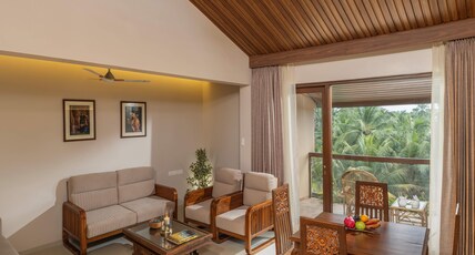 Uday Suites - The Airport Hotel Room Type - Raja Ravi Varma Suite with living room and poolview Uday Suites - The Airport Hotel Room Type - Raja Ravi Varma Suite with living room and poolview