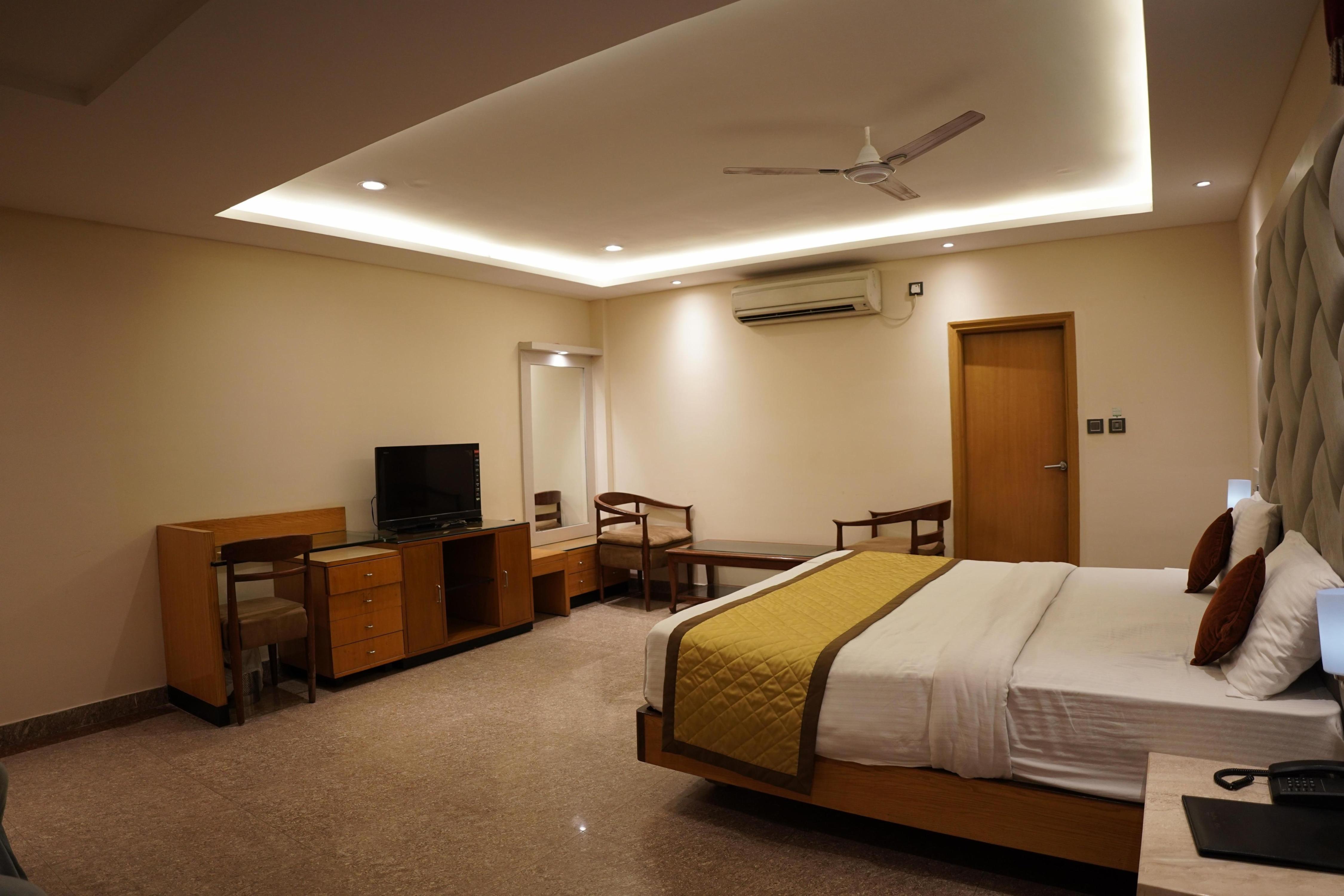 HOTEL VINAYAK & MOLECULE AIR BAR Room Type - Premium Club Room