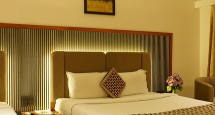 Hotel Ganpati Palace Room Type - Deluxe Triple Room