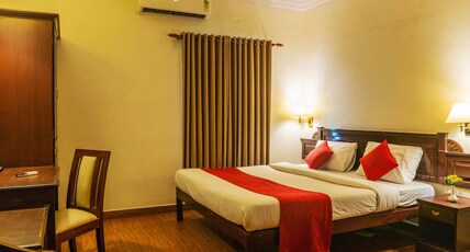 Archana Inn - Near Ernakulam Railway Station Room Type - Deluxe Double AC