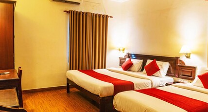 Archana Inn - Near Ernakulam Railway Station Room Type - Deluxe Triple Room AC