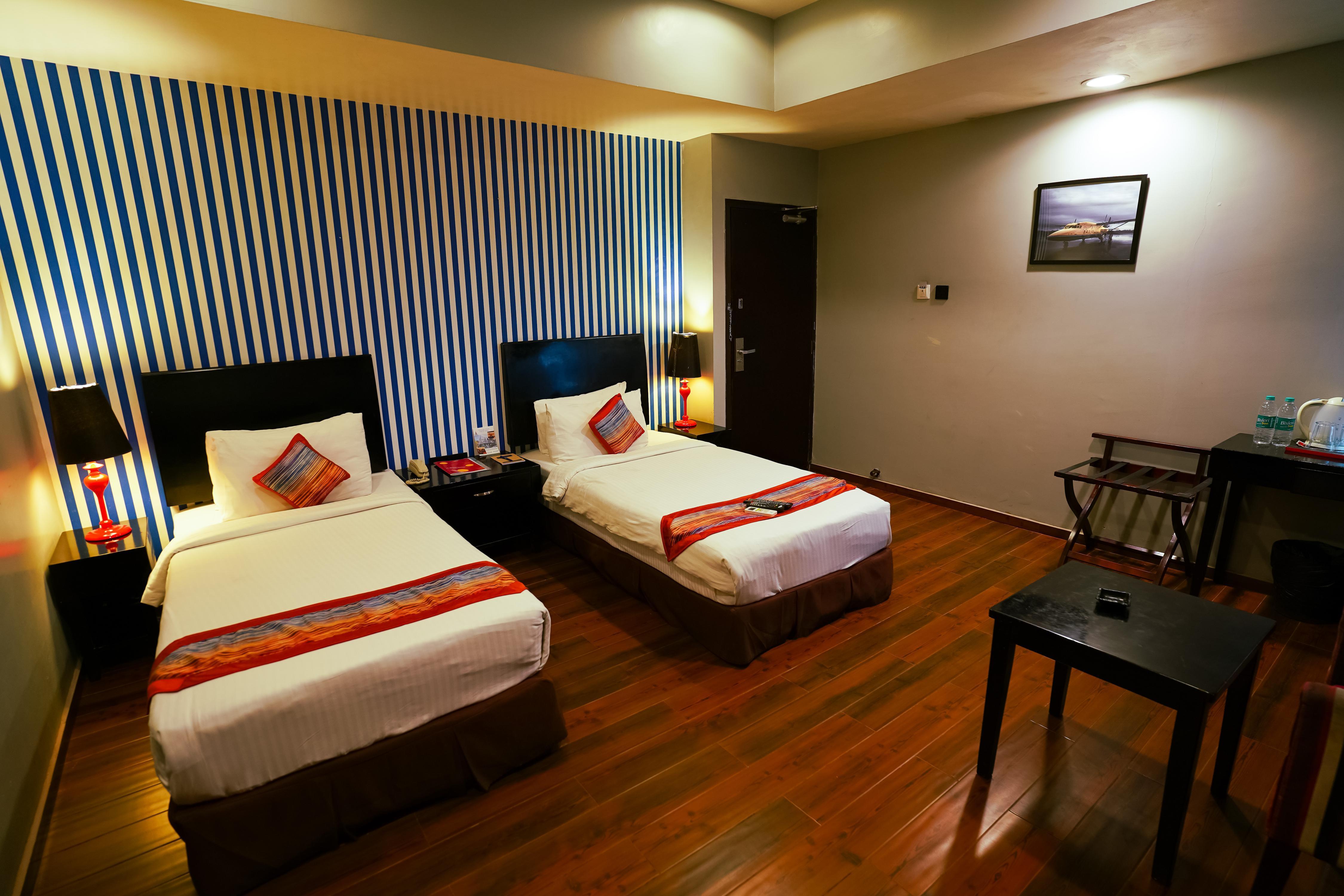The Travotel Suites - Your Smart Stay Near Airport - Tap to explore photos