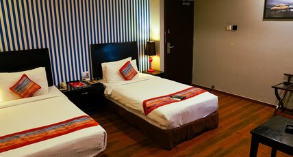The Travotel Suites - Your Smart Stay Near Airport Room Type - Deluxe Twin