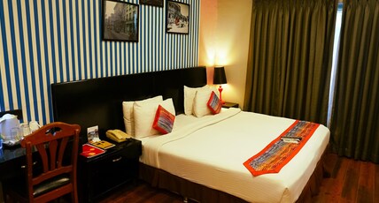 The Travotel Suites - Your Smart Stay Near Airport Room Type - Deluxe