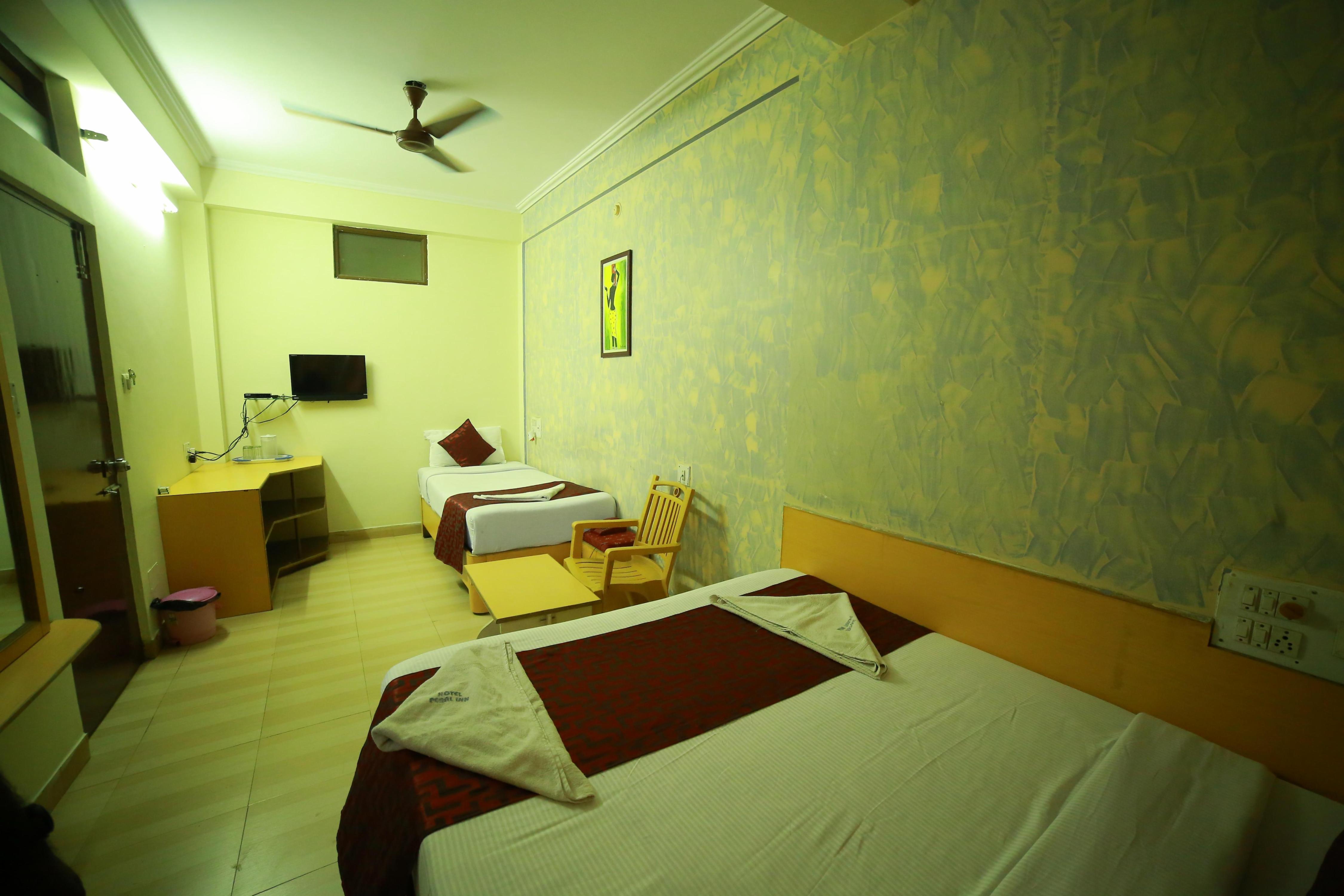 Pearl Inn Mysore - Tap to explore photos