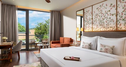Taj Damdama Lake Resort & Spa, Gurugram Room Type - Deluxe Pool View Room with Balcony King Bed Taj Damdama Lake Resort & Spa, Gurugram Room Type - Deluxe Pool View Room with Balcony King Bed