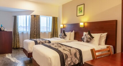 Zip By Spree Hotels Mangala Towers Thrissur Room Type - Deluxe Twin Room Zip By Spree Hotels Mangala Towers Thrissur Room Type - Deluxe Twin Room