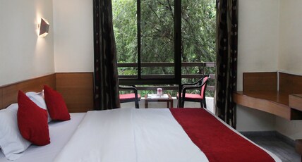 Hotel Sargam, Nagar Road Room Type - Deluxe King Room (NON AC)